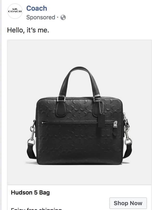A sponsored Facebook ad from Coach reading “Hello, it’s me.” above a plain black Hudson 5 leather briefcase