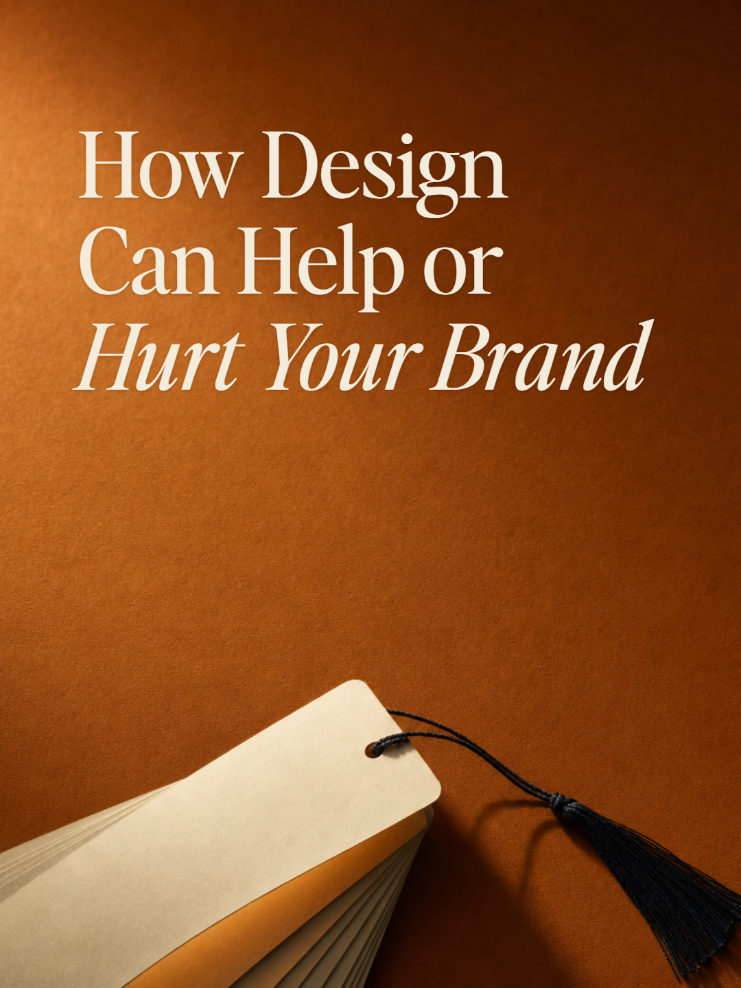 A promotional bookmark with a silk tassel resting on the edges of an open book, on a rust clay surface. Title: How Design Can Help or Hurt Your Brand.